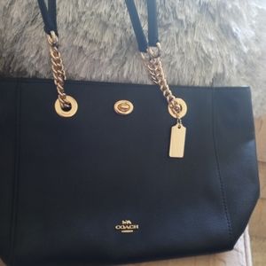 Black and gold handbag tote